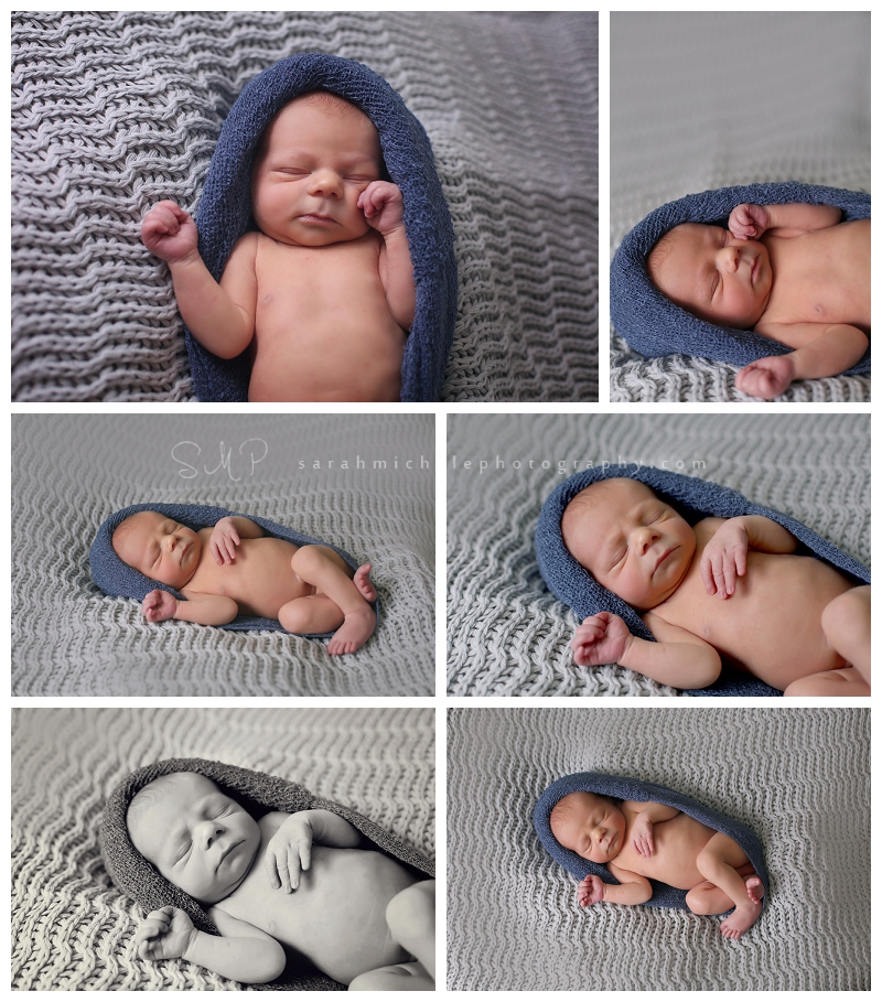 newborn baby boy on gray blanket