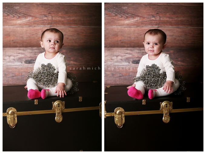 12 month portrait with barn wood and black trunk 