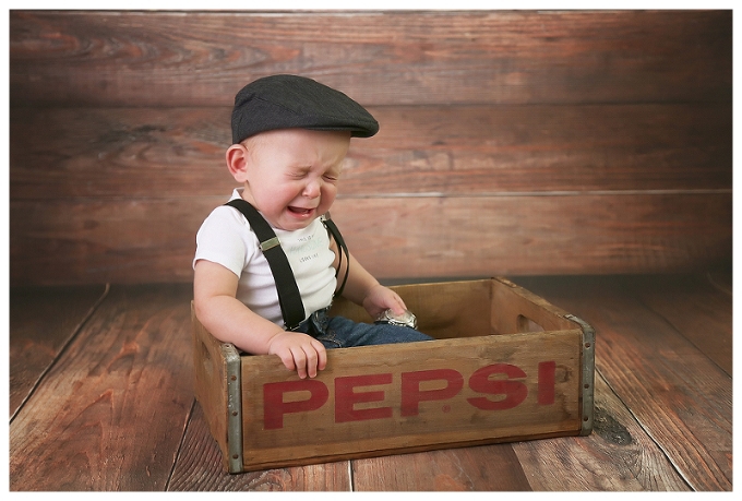 crying baby boy in pepsi box maryland family photographer