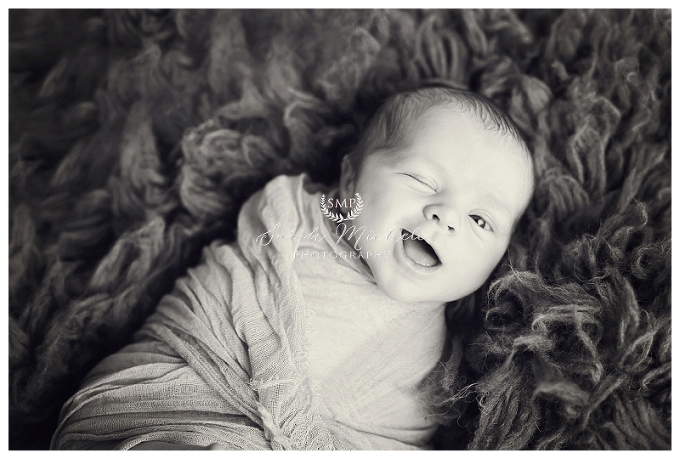 Annapolis Newborn Photographer Baby winking and smiling