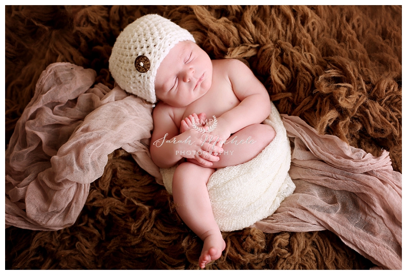 Annapolis Newborn Photographer baby wearing ivory hat