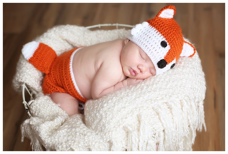 Annapolis Newborn photographer baby wearing fox outfit