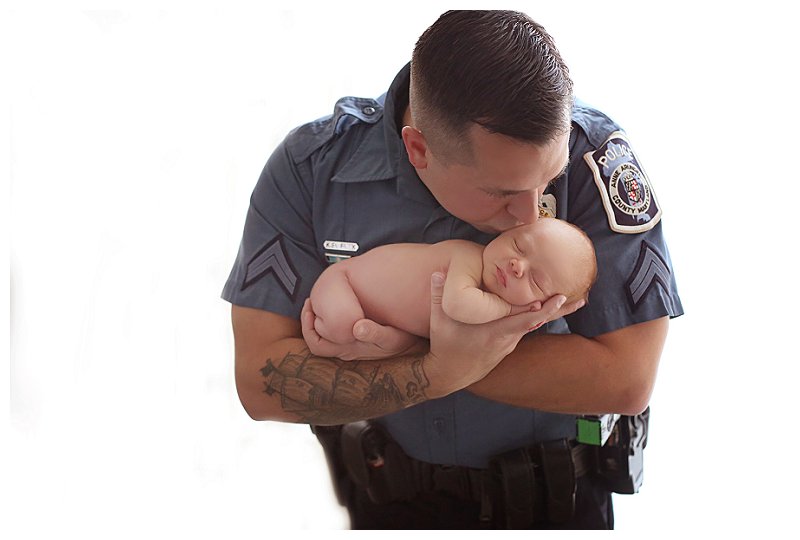 Annapolis family Photographer police officer with baby
